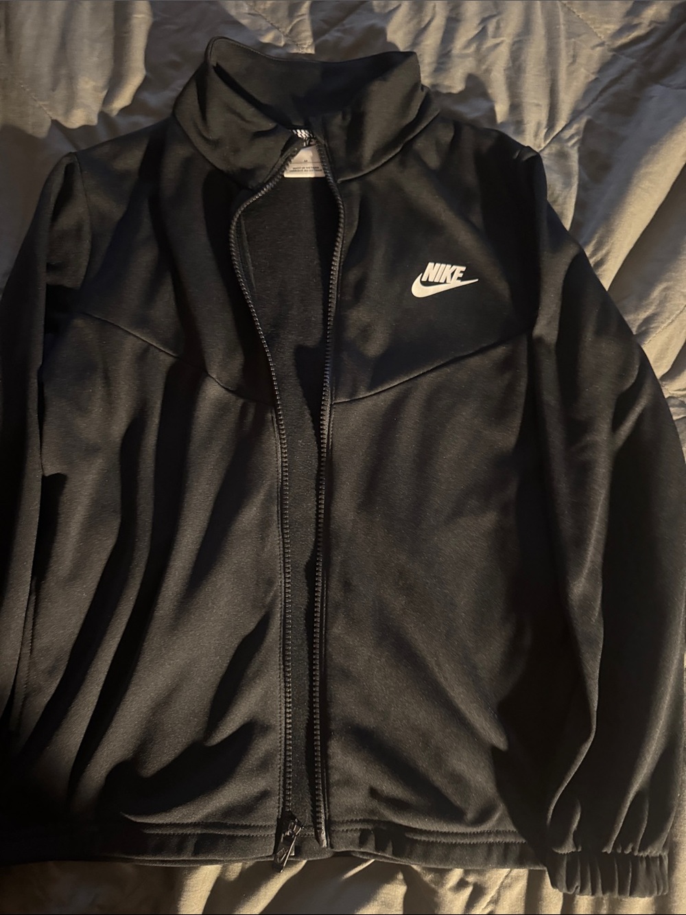 Boys black Nike size medium